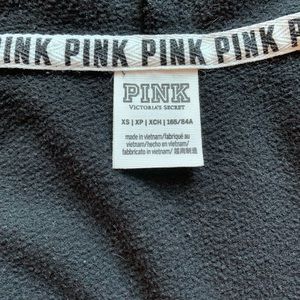 Black PINK zip up hooded jacket.